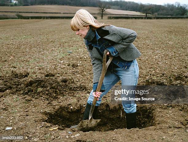 farmer digging a hole - digging hole stock pictures, royalty-free photos & images