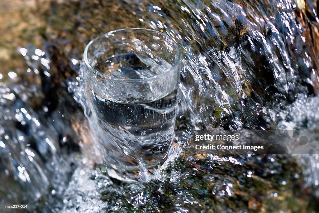 Drinking glass in stream
