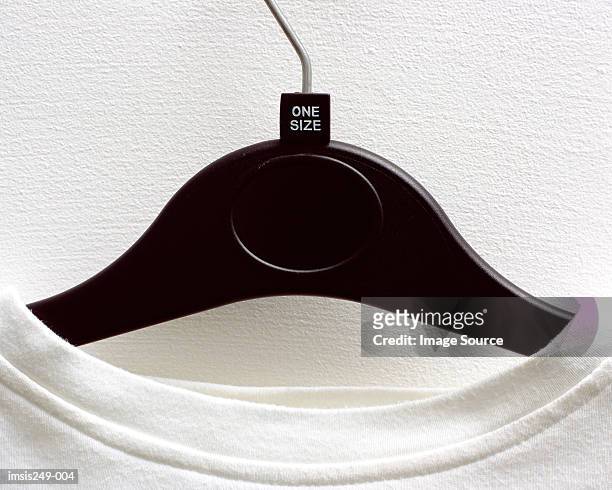 t-shirt on hanger - collar stock pictures, royalty-free photos & images
