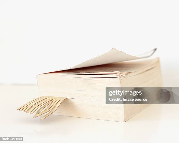 book with bookmark - dicht stock-fotos und bilder