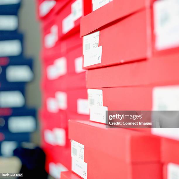 stacked shoe boxes - blue shoe box stock pictures, royalty-free photos & images