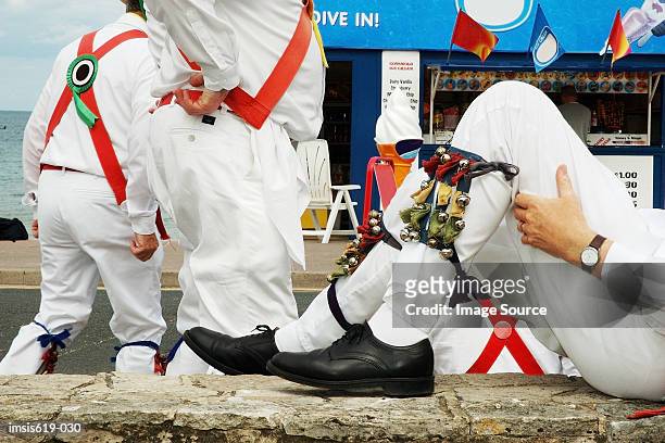 morris dancers relaxing - morris dancer stock pictures, royalty-free photos & images