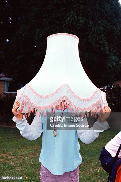 girl wearing a lampshade - lamp shade stock pictures, royalty-free photos & images