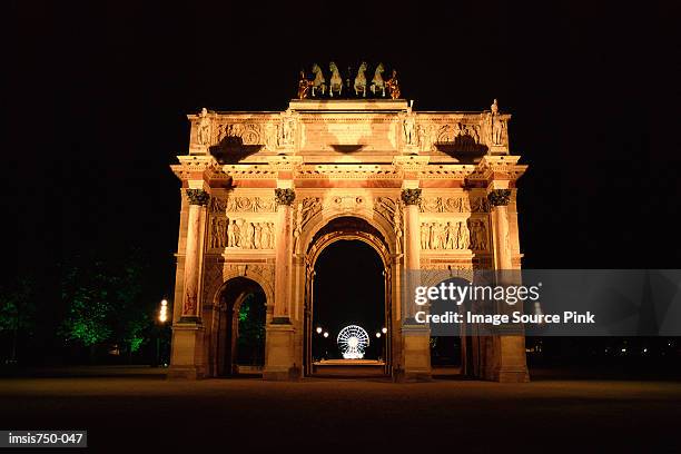 illuminated building - arc de triomphe du carrousel stock pictures, royalty-free photos & images