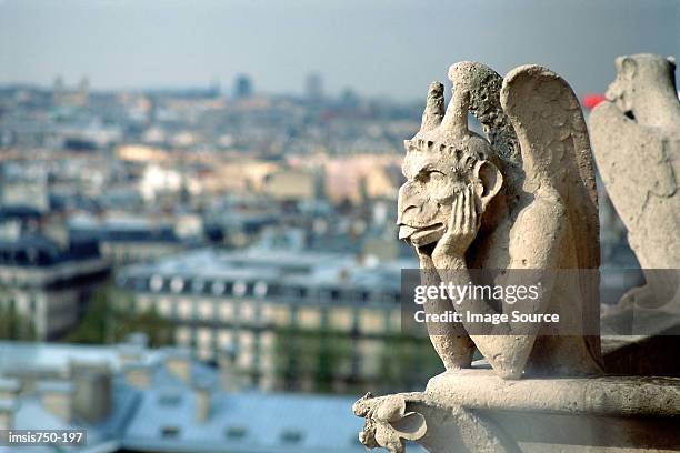 gargoyle on notre-dame paris - paris rocks stock pictures, royalty-free photos & images