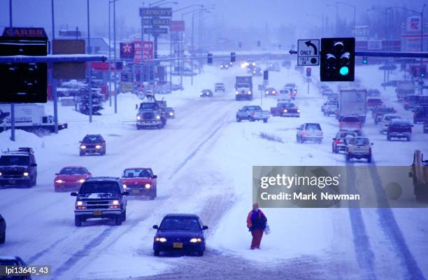 overhead of traffic in winter snow, anchorage, united states of america - cook inlet stock pictures, royalty-free photos & images