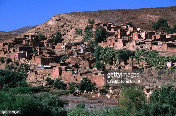 village in the nfiss gorge on the tizi-n-test highway, toubkal national park, morocco - toubkal stock pictures, royalty-free photos & images