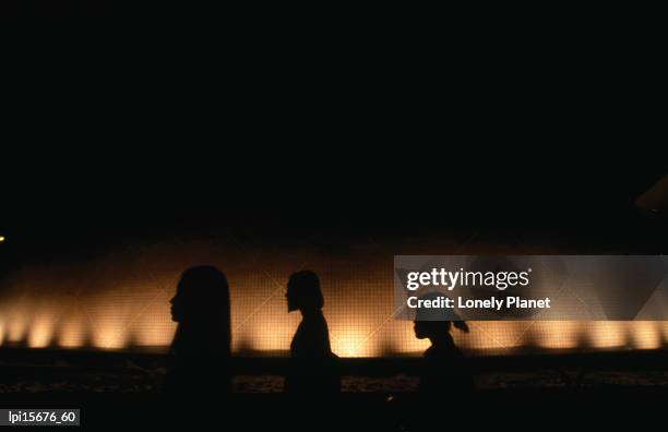 people walking past hong kong space museum. - hong kong stockfoto's en -beelden