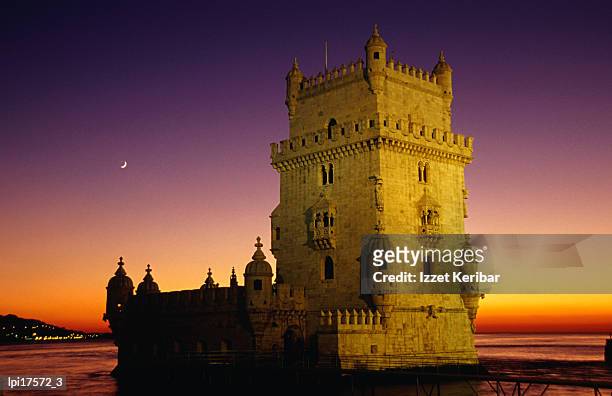 tower of belem at sunset, low angle view, lisbon, portugal - travel12 stock pictures, royalty-free photos & images