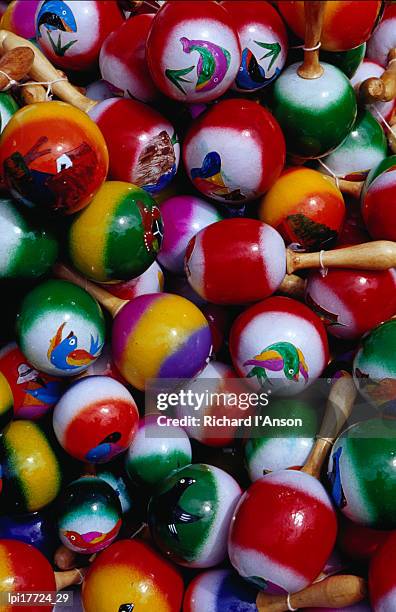 maracas for sale at poncho plaza market, otavalo, ecuador - for sale korte frase stockfoto's en -beelden