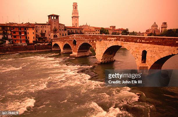ponte di pietra over the adige river, verona, italy - adige stock pictures, royalty-free photos & images