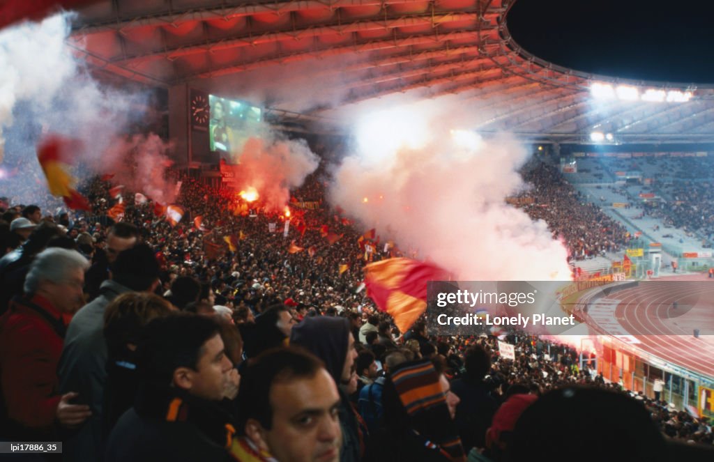 Flares in Curva Sud stand at Champions League Game Stadio Olimpico, Rome, Italy