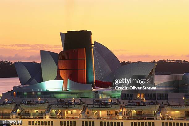 cruise ship in front of sydney opera house, low angle view, sydney, australia - opera house imagens e fotografias de stock