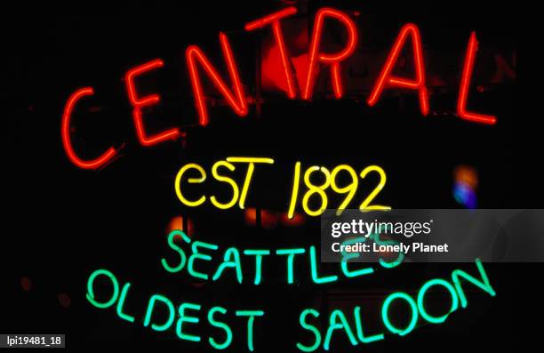 neon sign of central saloon, seattle, washington, united states of america, north america - escrita ocidental imagens e fotografias de stock