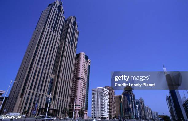 hotel (left) on sheikh zayed road. - zayed stock-fotos und bilder