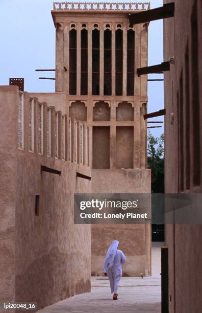 man walking in lanes of bastikia quarter. - quarter bildbanksfoton och bilder