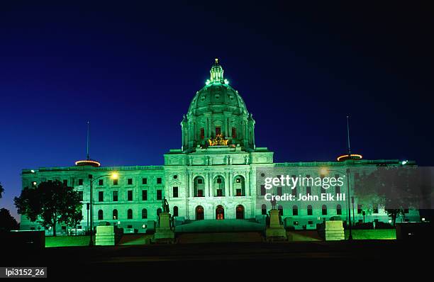 minnesota state capitol lit up at night, low angle view, minneapolis, united states of america - minnesota state capitol building stock pictures, royalty-free photos & images