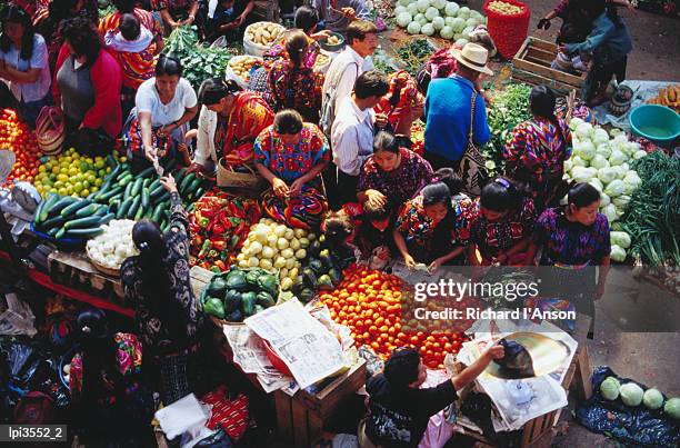 fruit and vegetable stalls at sunday market, chichicastenango, quiche, guatemala, central america & the caribbean - chichicastenango bildbanksfoton och bilder