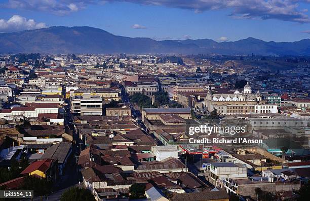 cityscape of guatemala's second largest city, quetzaltenango, guatemala, central america & the caribbean - quetzaltenango stock pictures, royalty-free photos & images