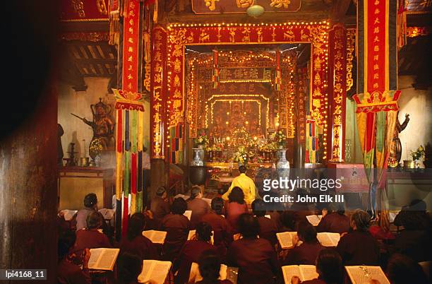 service in tran quoc pagoda, hanoi, vietnam - iii stock pictures, royalty-free photos & images