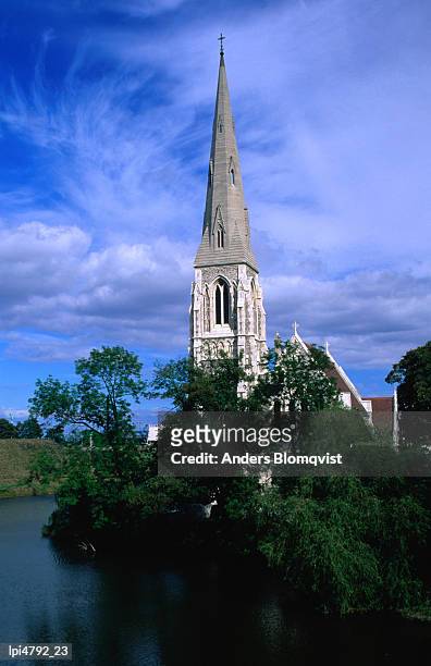 spire of st albans anglican church, copenhagen, denmark, europe - st. albans stock pictures, royalty-free photos & images