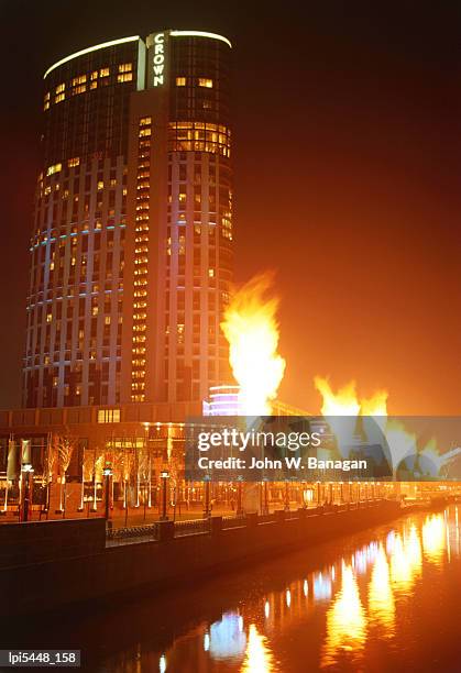 fire show in front of crown casino, low angle view, melbourne, australia - banagan stock pictures, royalty-free photos & images