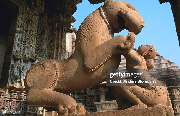 statue at kandarya mahadeva temple, low angle view, khajuraho, india - khajuraho statues stock pictures, royalty-free photos & images