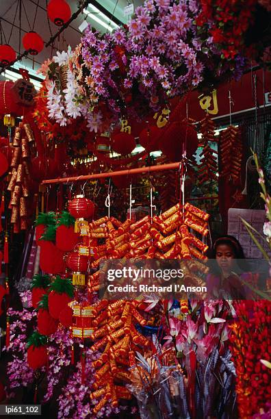 garlands of firecrackers and flowers, melaka, melaka, malaysia, south-east asia - east malaysia stock pictures, royalty-free photos & images