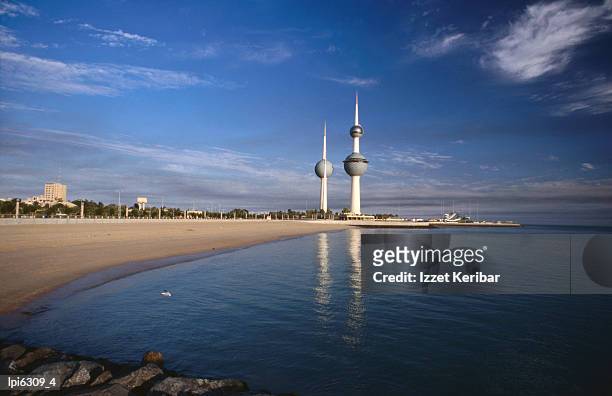 kuwait city water towers on seafront, low angle view, kuwait, kuwait - kuwait towers stock pictures, royalty-free photos & images