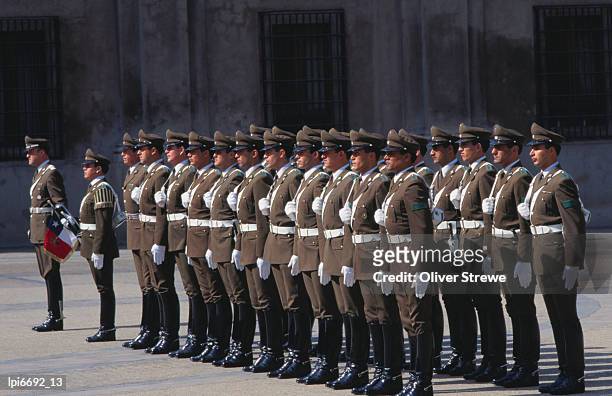 changing of palace guard at plaza de la constitution, front view, santiago, chile - historical document ストックフォトと画像