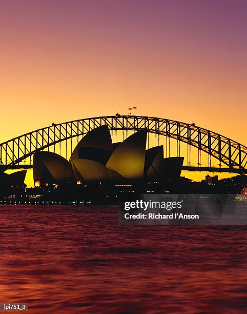 sydney opera house and sydney harbour bridge at sunset, sydney, australia - opera house imagens e fotografias de stock