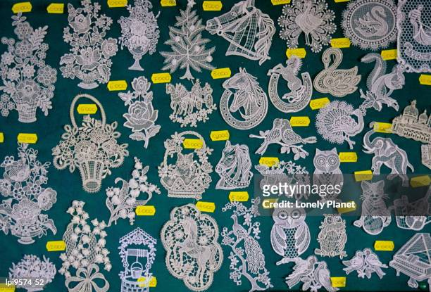 lace motifs from burano for sale, venice, italy - commercial event stockfoto's en -beelden
