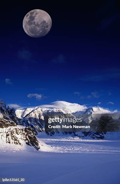 high moon over the ruth ampitheatre on ruth glacier., denali national park & preserve, alaska, united states of america, north america - denali national park foto e immagini stock