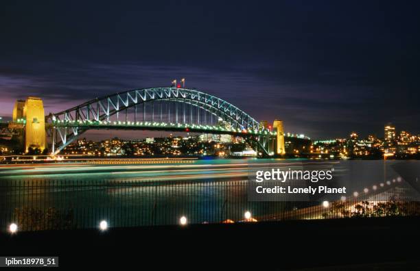 sydney harbour bridge at dusk from the botanic gardens, sydney, new south wales, australia, australasia - lpiowned stock pictures, royalty-free photos & images