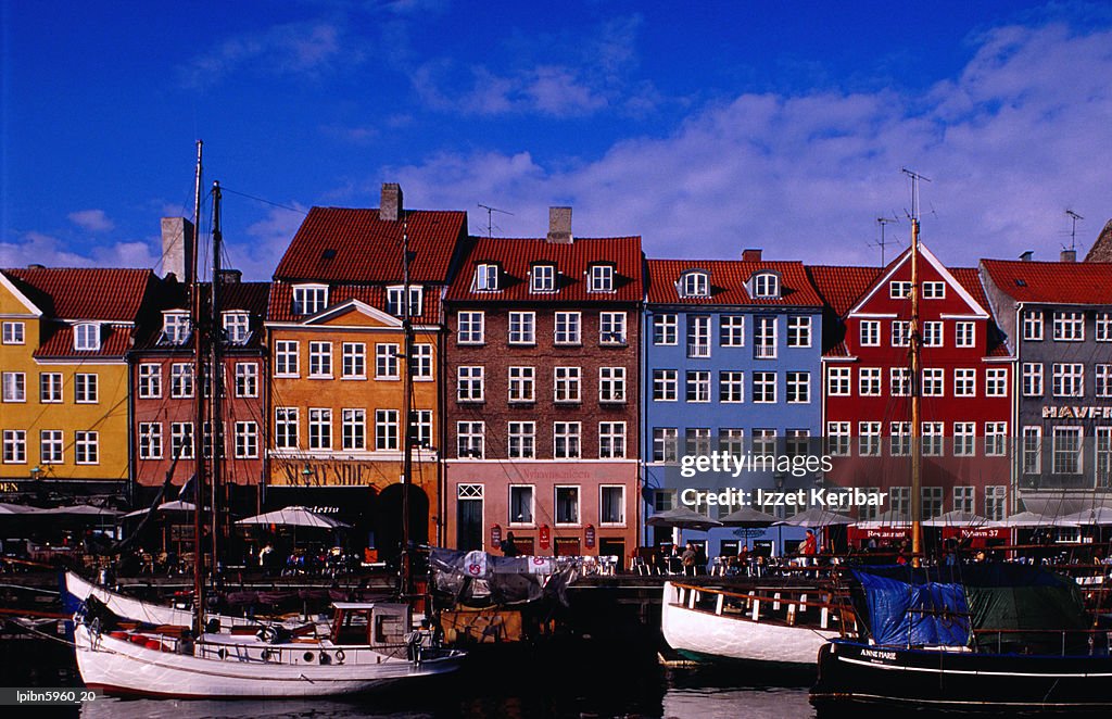 The colourful houses and restaurants of Nyhavn., Copenhagen, Copenhagen, Denmark, Europe