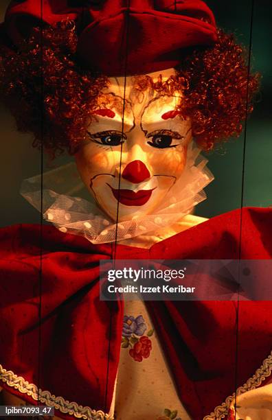 clown-faced marionette in a shop., athens, attica, greece, europe - central greece stock pictures, royalty-free photos & images