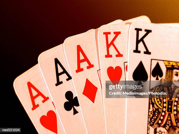 close-up of a hand of aces - cartas na mão imagens e fotografias de stock