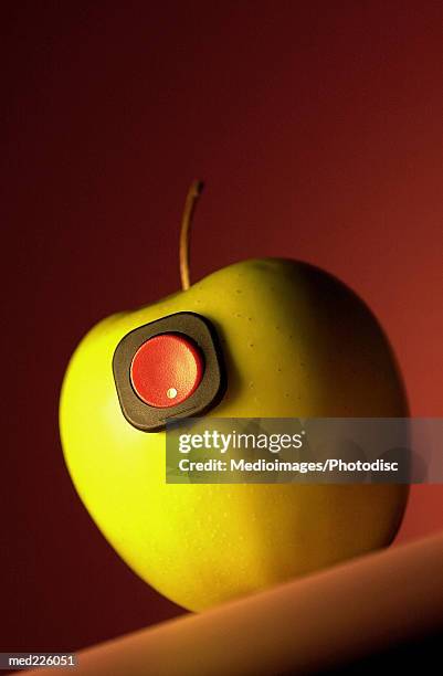 button on an apple - religiöses ereignis stock-fotos und bilder