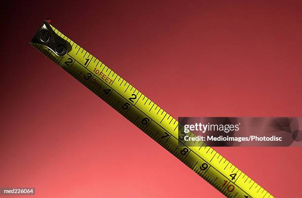 a measurement tape - metric system stock pictures, royalty-free photos & images