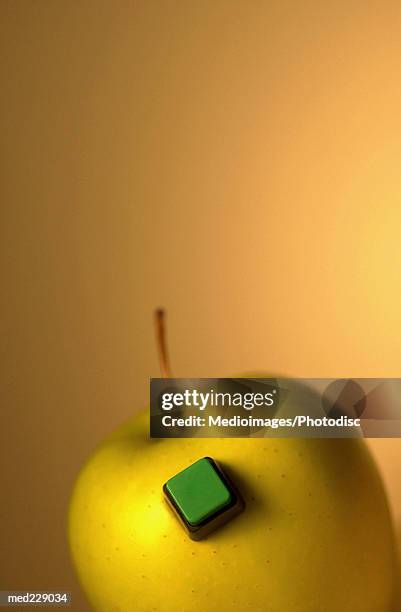 an apple with a button - religious event stock pictures, royalty-free photos & images