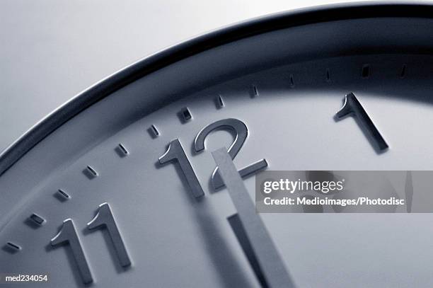 close-up of a wall clock - hour hand stock pictures, royalty-free photos & images