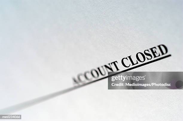 close-up of account closed printed on a sheet of paper - account closed stock pictures, royalty-free photos & images