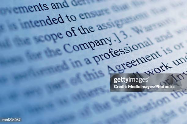 close-up of text printed on paper - escrita ocidental imagens e fotografias de stock