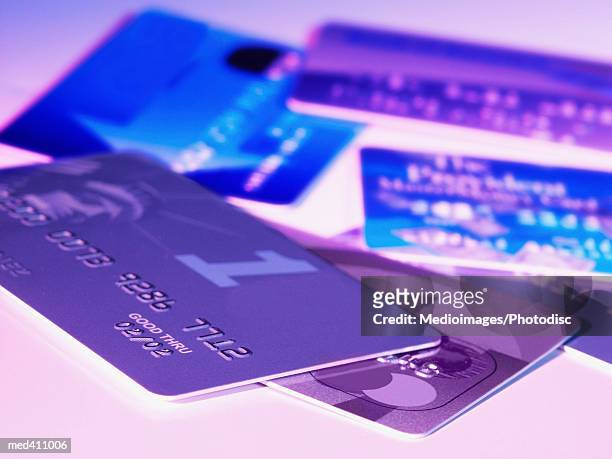 close-up of credit cards - credit card and stapel stockfoto's en -beelden