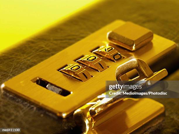 close-up of a combination latch of a briefcase - latch stock pictures, royalty-free photos & images