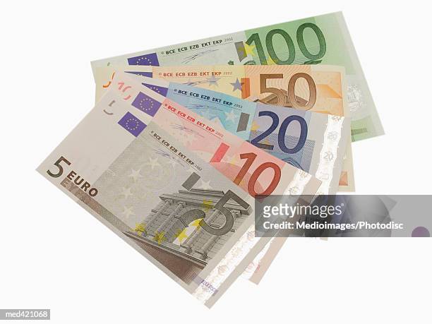 array of euro bank notes - twenty euro banknote stock pictures, royalty-free photos & images