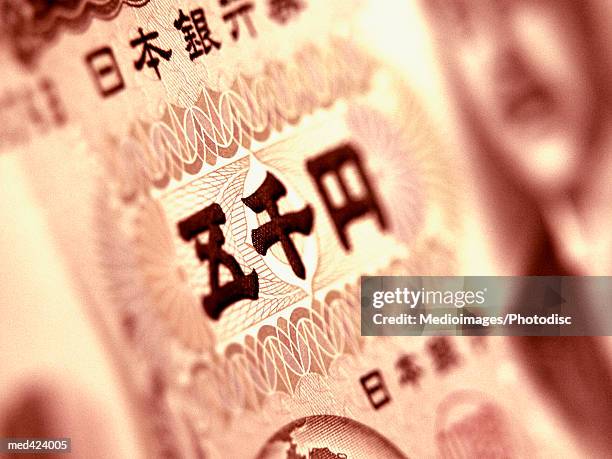 close-up of a japanese bank note - only japanese ストックフォトと画像