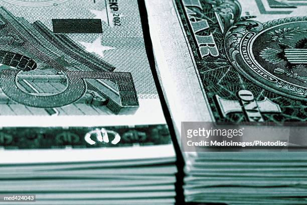 stacks of american and euro bank notes - moeda de um dólar dos estados unidos imagens e fotografias de stock