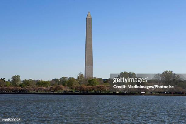 washington monument, from across the potomac river in washington, dc, usa - the monument stock pictures, royalty-free photos & images