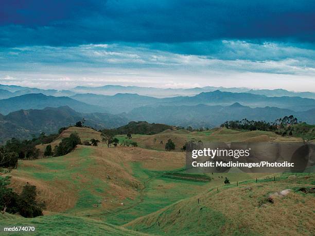 view of the mountains under rain clouds in colombia, south america - altocúmulo fotografías e imágenes de stock